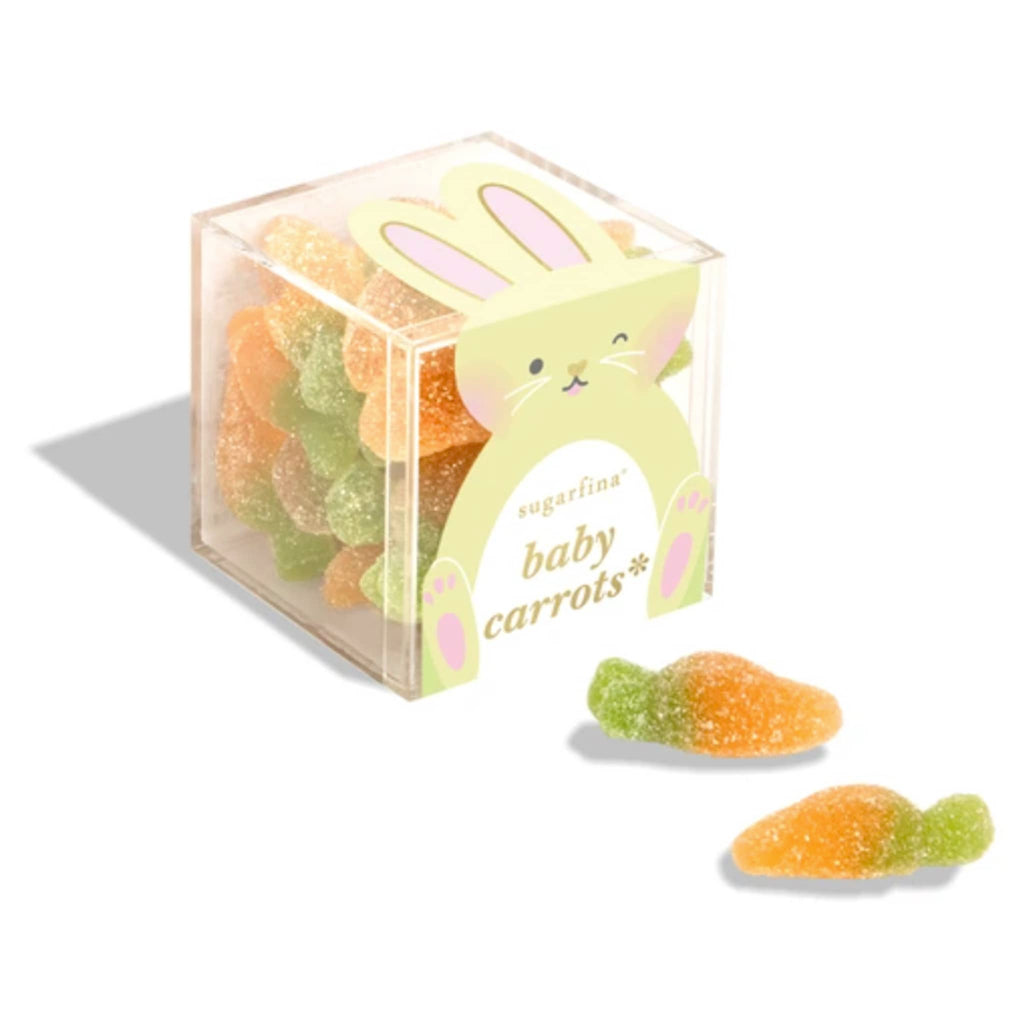 Sugarfina Easter 2025 Baby Carrots gummy candy in candy cube packaging, front angle with 2 pieces of candy in front.