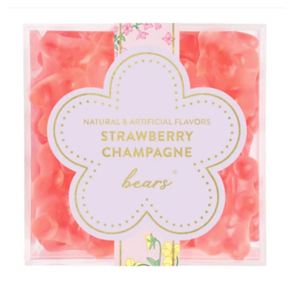 Sugarfina La Vie en Rose Collection Strawberry Champagne Bear gummies in clear acrylic candy cube packaging, top view.