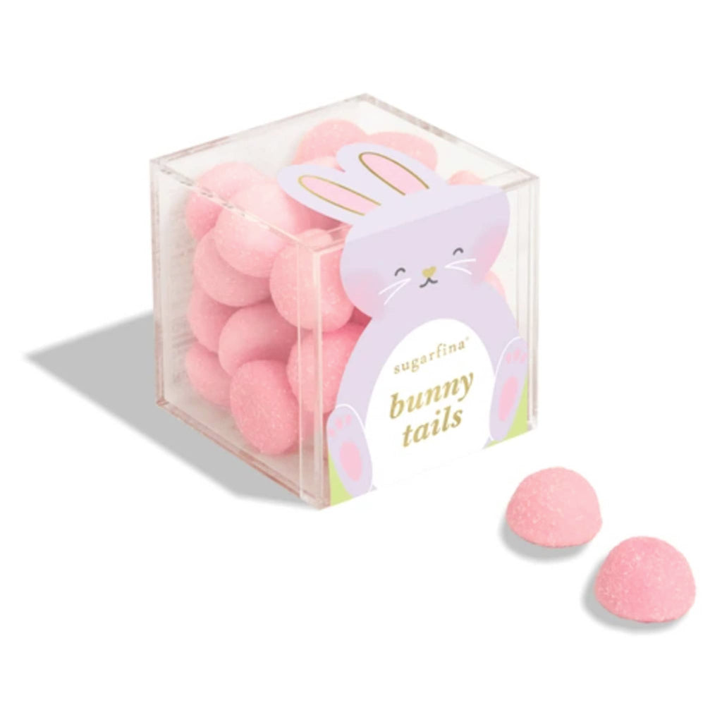 Sugarfina Easter 2025 Bunny Tails candy in candy cube packaging, front angle with 2 pieces of candy in front.