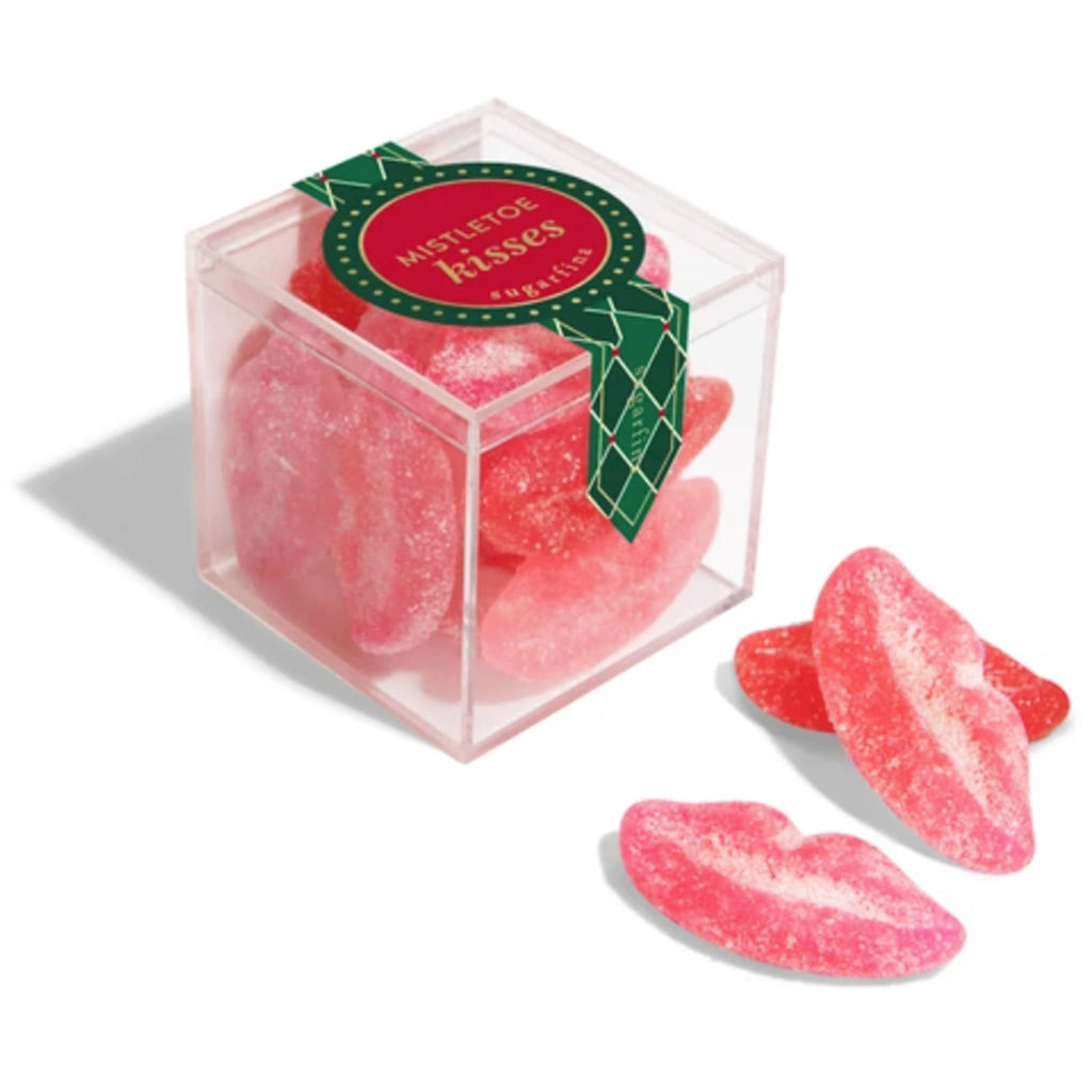 Sugarfina Holiday 2024 Mistletoe Kisses Sugar Lips gummy candy in candy cube packaging with candies in front.