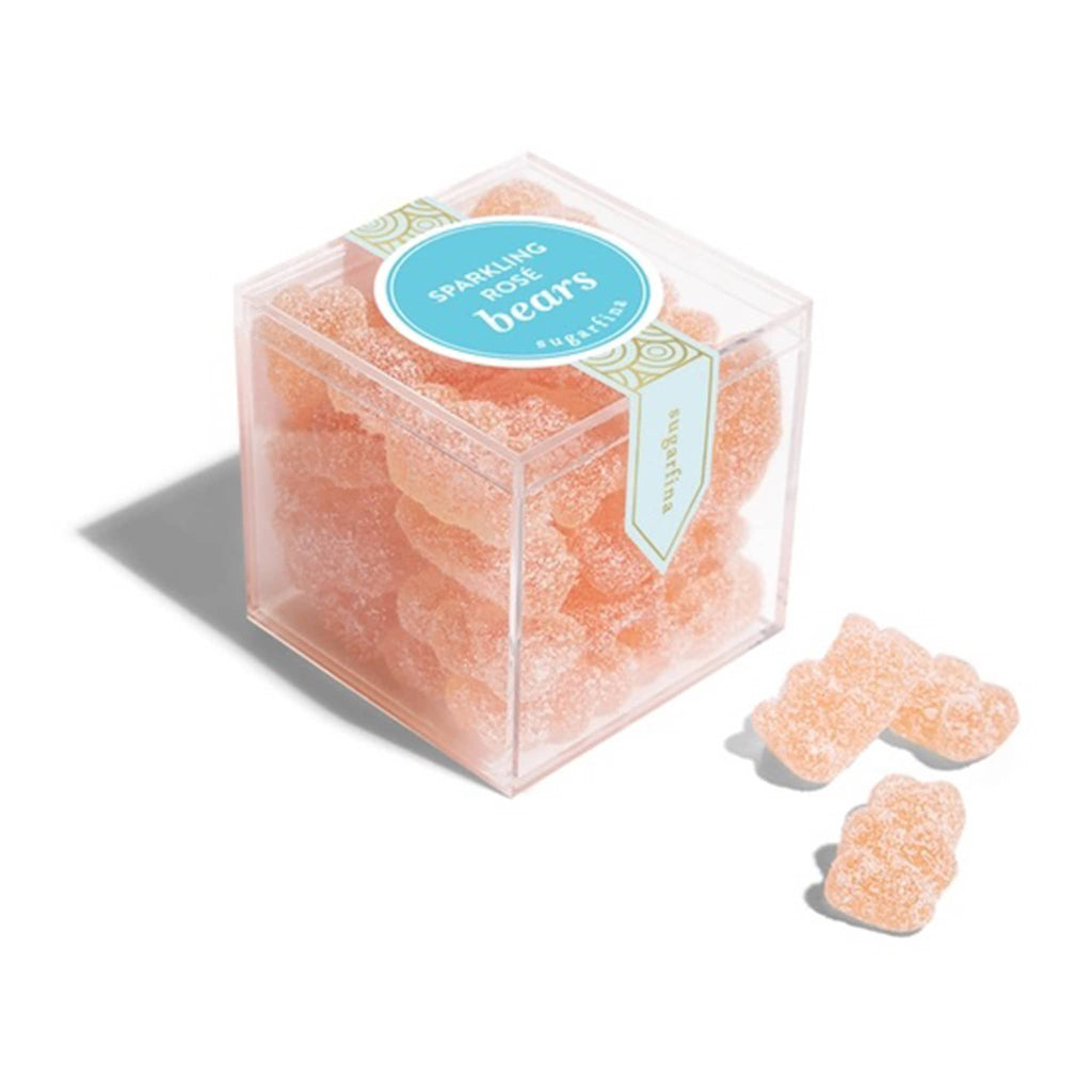 Sugarfina sparkling rose bears gummy candy in clear acrylic candy cube packaging, front angle view.