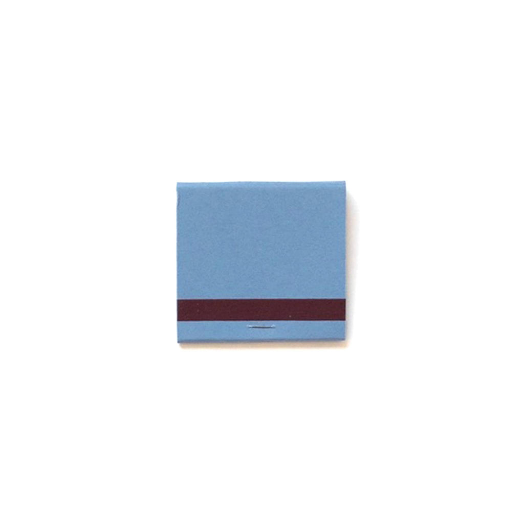 Small blue matchbook with striker strip on a white background.