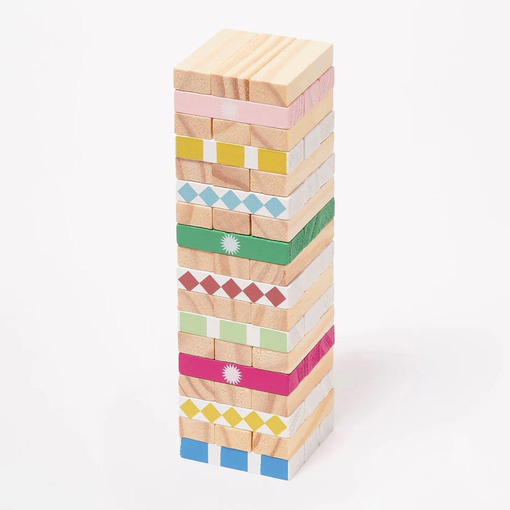 Sunnylife Travel Jumbling Tower in Majorelle, natural wood blocks stacked and hand-painted with prints, front and side view.