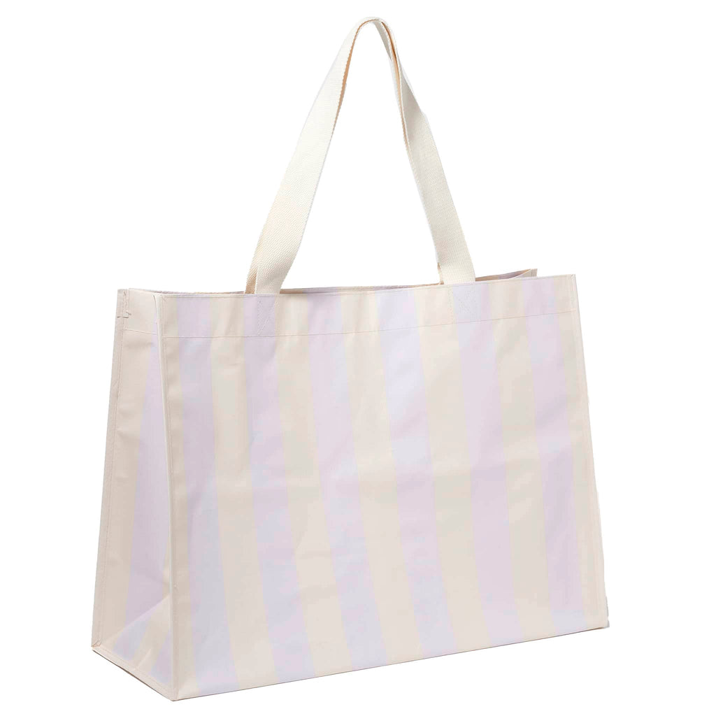 Sunnylife Carryall Beach Bag in Rio Sun Lilac Stripe, front angle view with white webbed handles up.