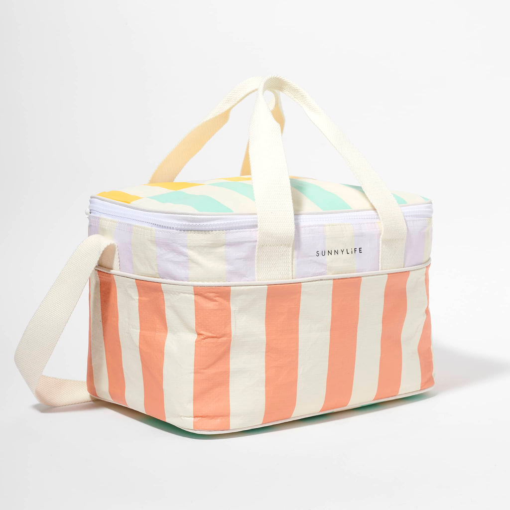 Sunnylife Cooler Bag in Rio Sun with blue, yellow, lilac, orange and cream maxi stripes, front and side view, closed with handles up.