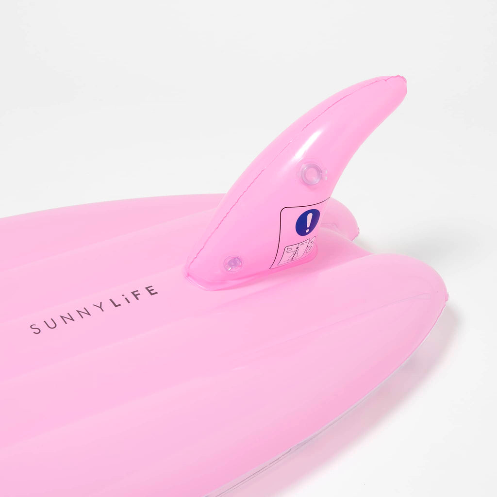 Sunnylife Summer Sherbet Kids Inflatable Surfboard Float pool toy, detail of solid pink bottom and stability fin of inflated surfboard.