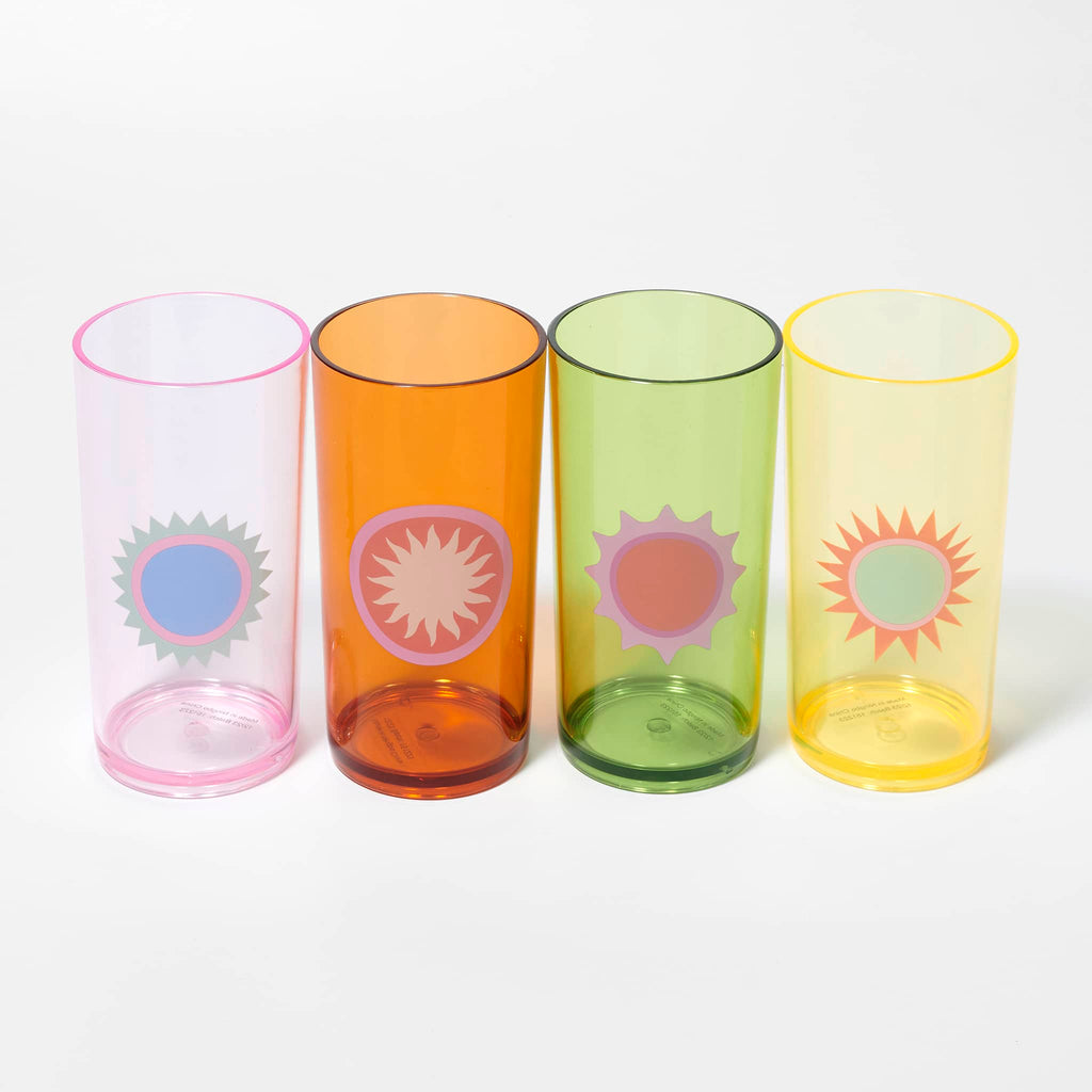 Sunnylife Rio Sun Poolside Tall Acrylic Tumbers, set of 4 with different sun graphics, left to right: pink, orange, green and yellow.