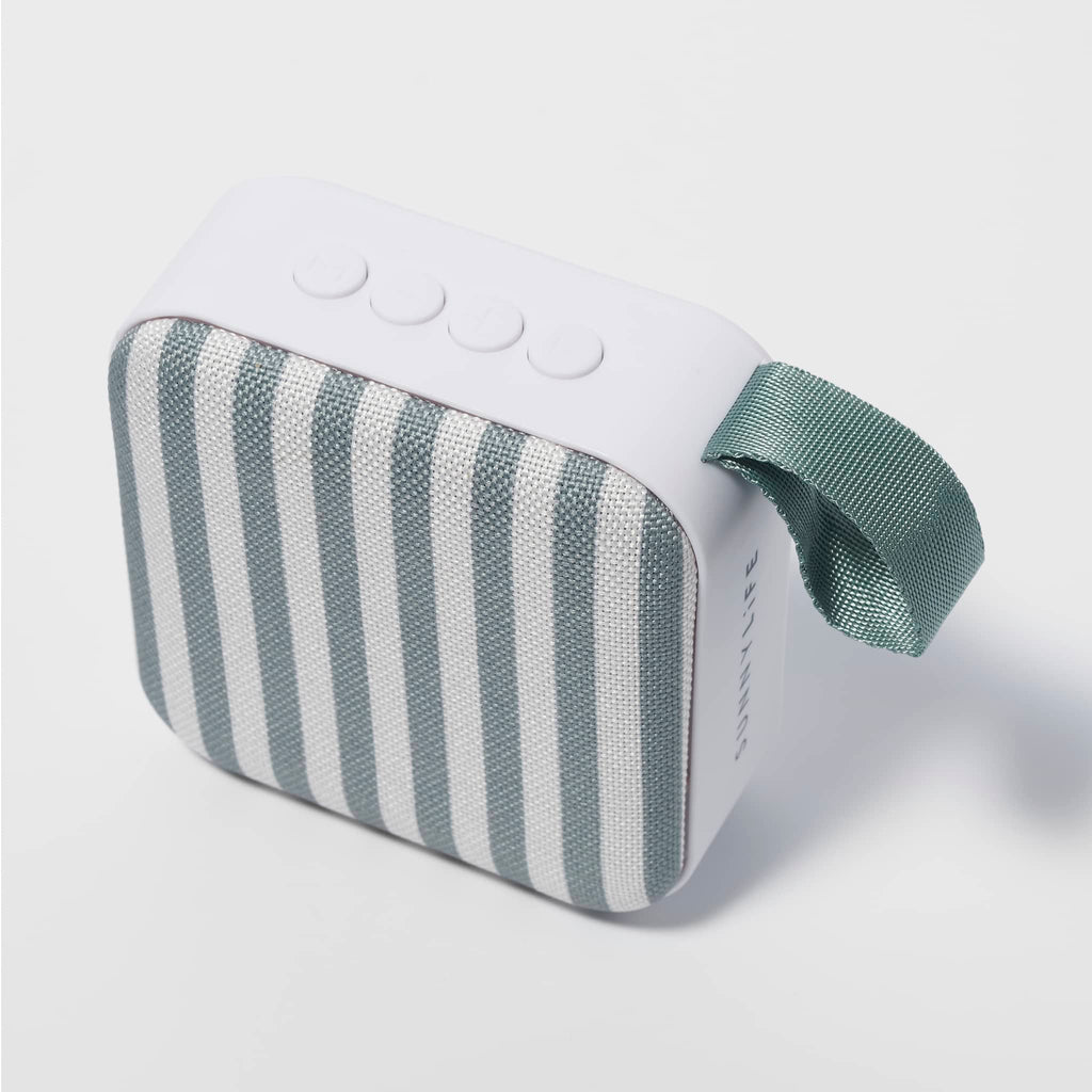 Sunnylife Portable Travel Speaker in The Vacay Olive and Cream Stripe, overhead view showing control buttons and carry strap.