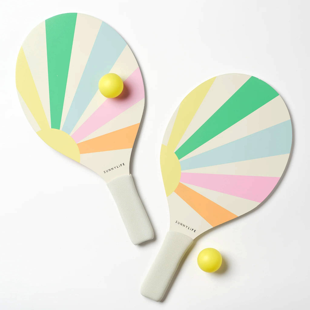 Sunnylife beach paddle set in pastel gelato with yellow balls.