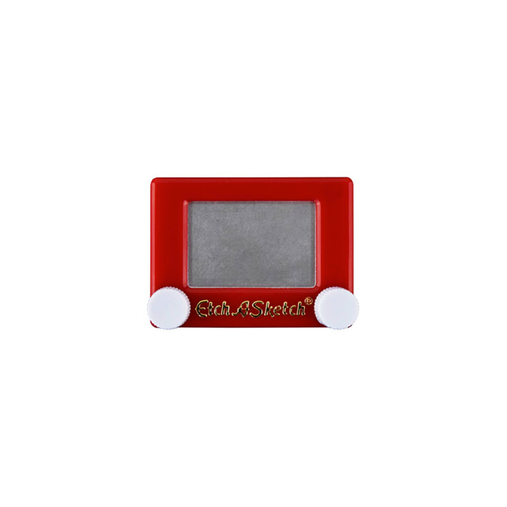 Mini red Etch-A-Sketch toy on a white background.