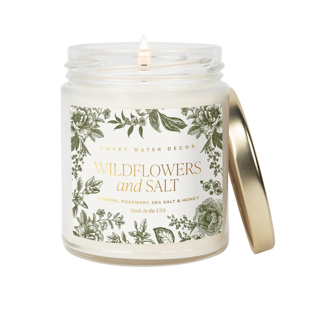 Sweet Water Decor Wildflowers and Salt scented soy wax blend candle with gold lid.