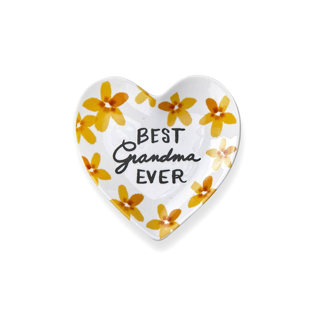 Tag Ltd Sentiments white stoneware heart-shaped trinket tray dish with yellow floral design and "best grandma ever" in black letters.