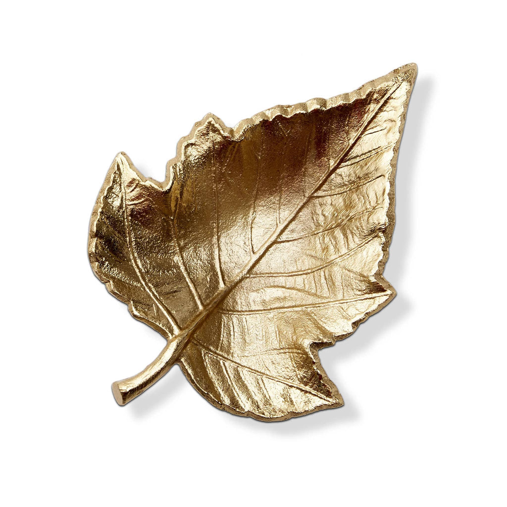 Leaf-shaped dish with antique gold finish on a white background.