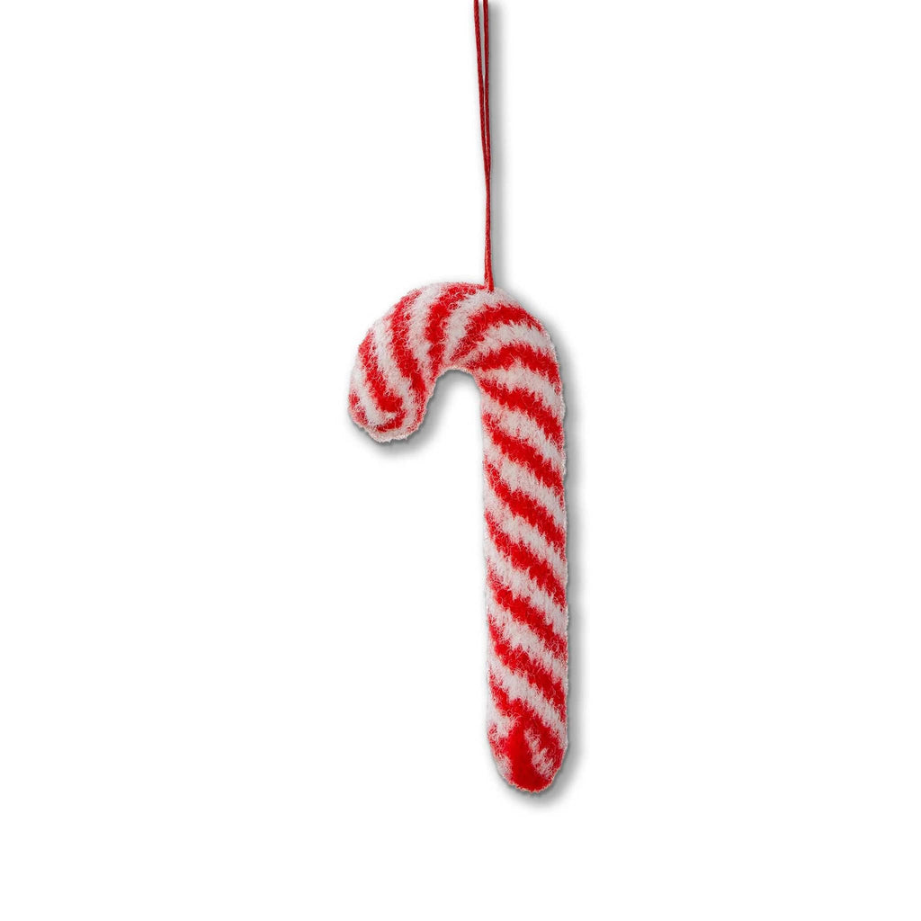 Red and white striped felt candy cane ornament on a white background.