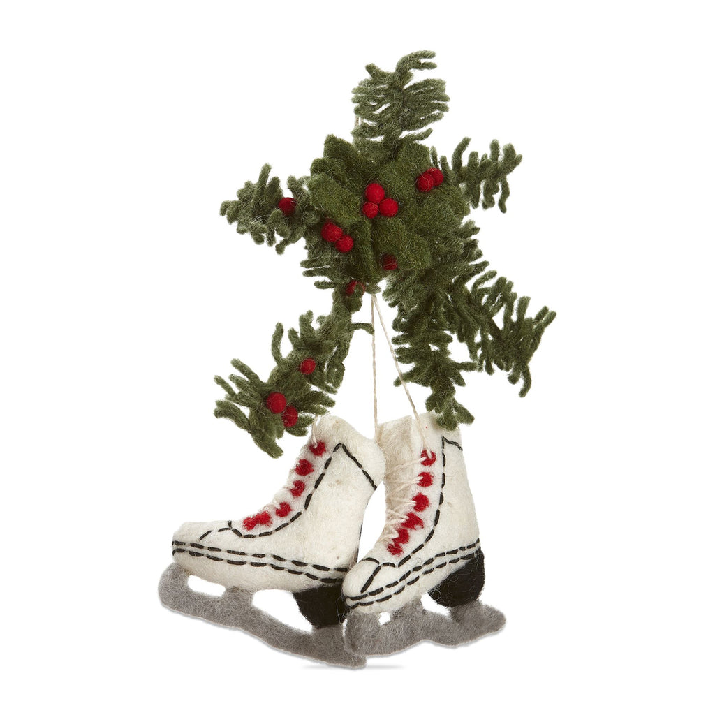 Tag Ltd wool felt ornament with berries on tree branches and white ice skates with black stitching and gray felt blade.