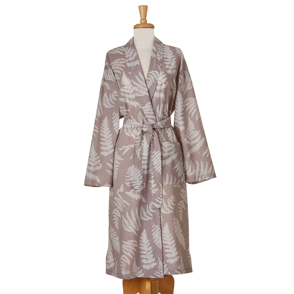 Tag Ltd Take Care of Yourself cotton robe in Fern, with white fern leaf print on a warm gray backdrop, shown on a dress form.