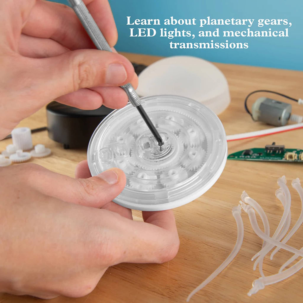 Person assembling a mechanical component with text about educational content.