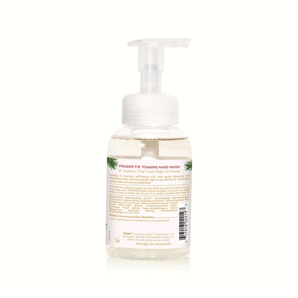 Back of foaming hand wash bottle with pump on a white background.