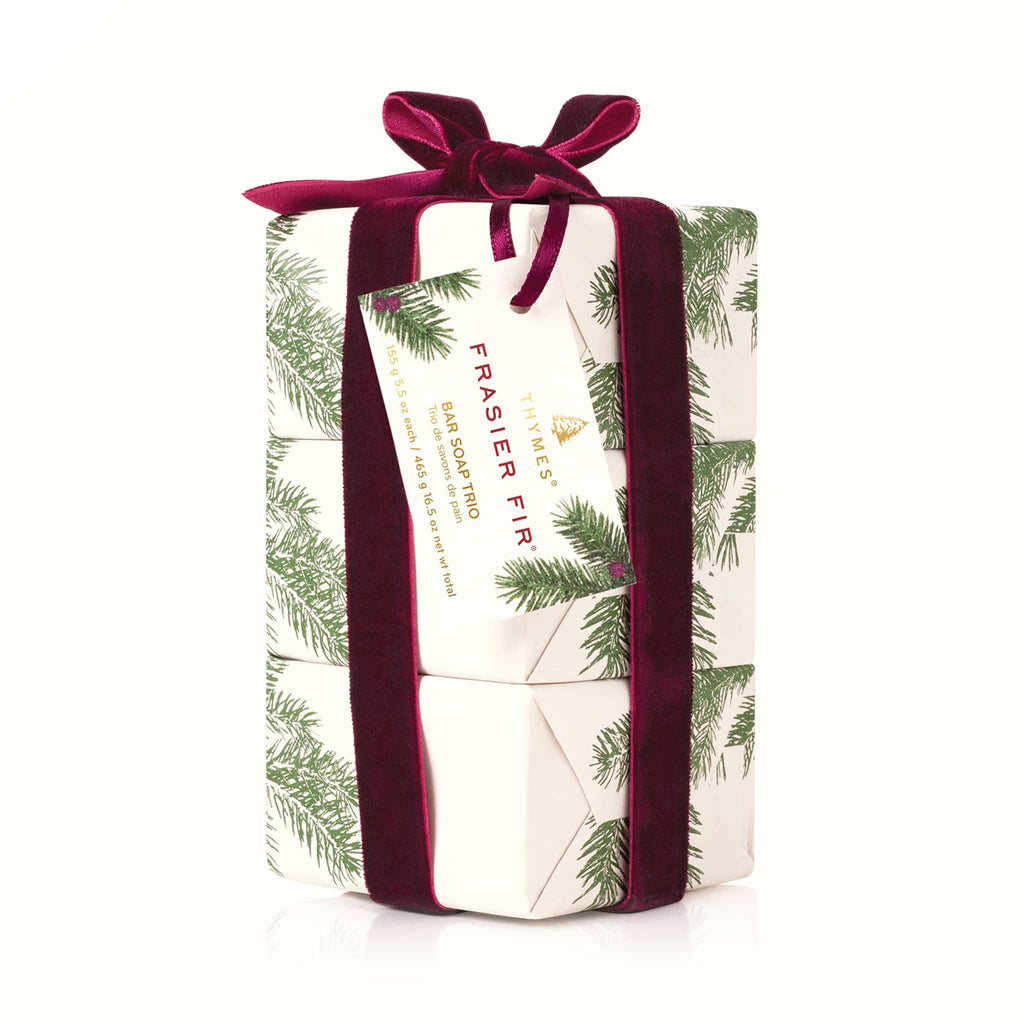 Thymes Frasier Fir Scented Bar Soap Trio, boxed soap wrapped in pine needle wrapping paper tied with a burgundy velvet bow.