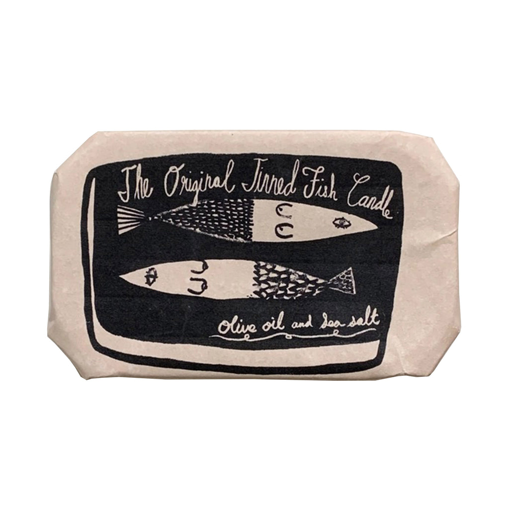 The Original Tinned Fish Candle with sea salt and ocean breeze scent in packaging.