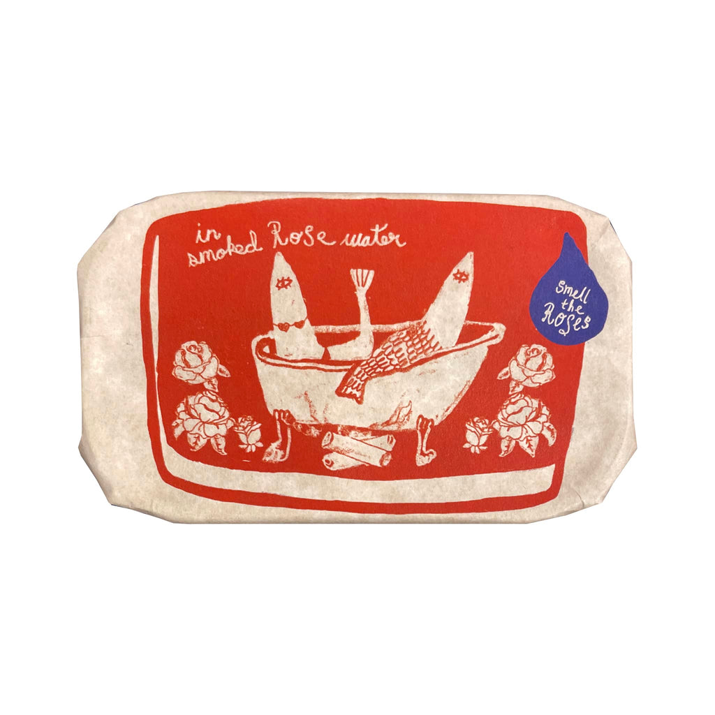 Tinned Fish in smoked rose water, rose scented candle in sardine tin with paper wrap packaging.
