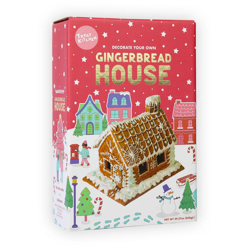 Gingerbread house kit packaging with a red background and gingerbread house illustration, on a white background.