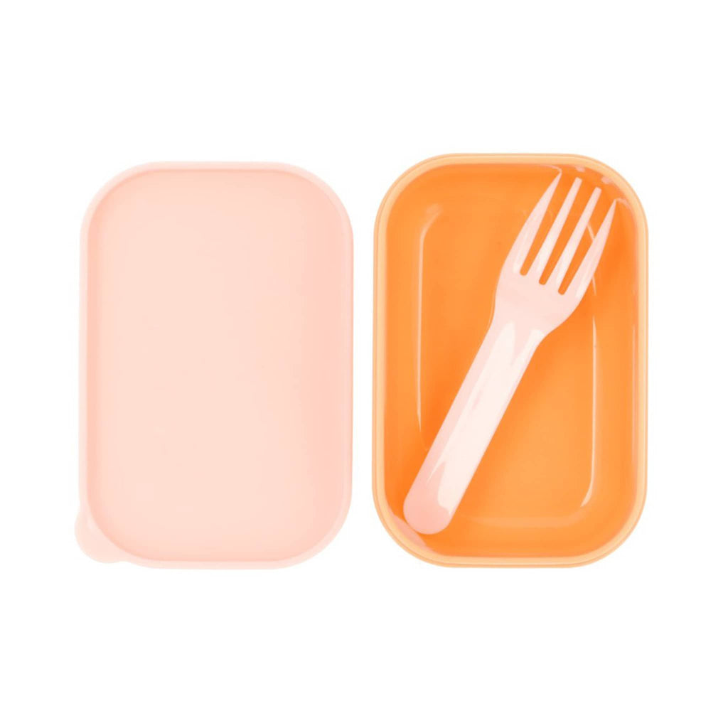 Pink and beige kids bento lunch box, small inner box, lid off showing orange interior with pink fork, overhead on a white background.
