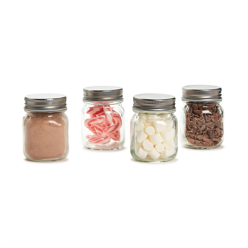 Two's Company 4 Piece Hot Cocoa Bar Kit in mason jars gift set lined up in a row.