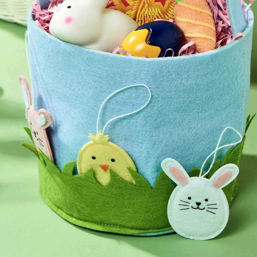 Two's Company Egg Hunt Surprise Easter Felt Basket with removable felt ornaments, detail of filled basket.