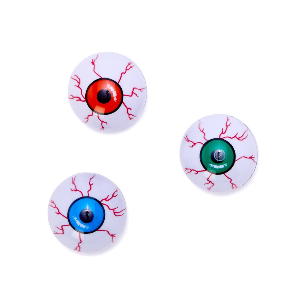 Three toy floating eyeballs with red, green, and blue irises on a white background.