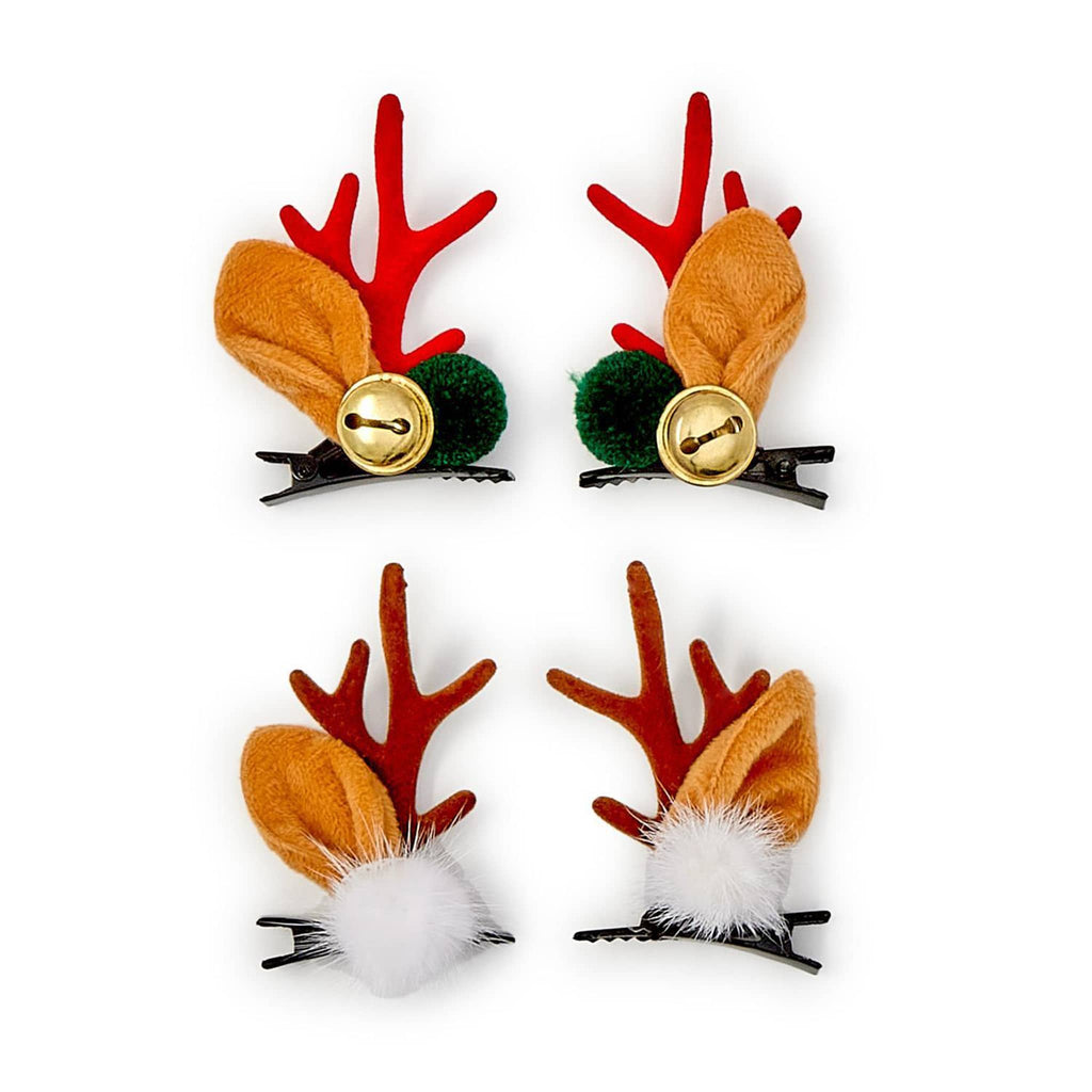 Set of reindeer antler hair clips with bells and pompoms, on a white background.