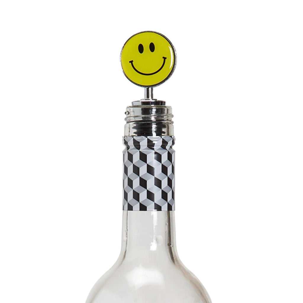 Two's Company smiley face bottle stopper, in use.