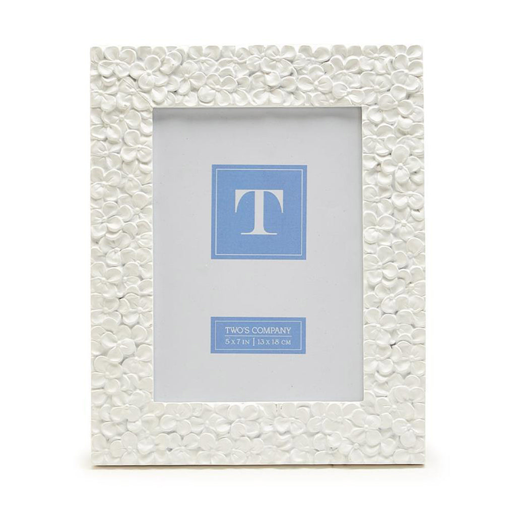 Two's Company 5x7 inch picture frame with white resin hydrangea pattern, front view.