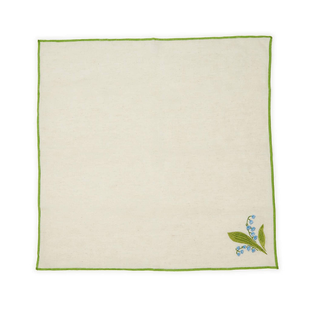 Two's Company Lily of the Valley embroidered cotton chambray napkins with blue flowers and green border, flat.