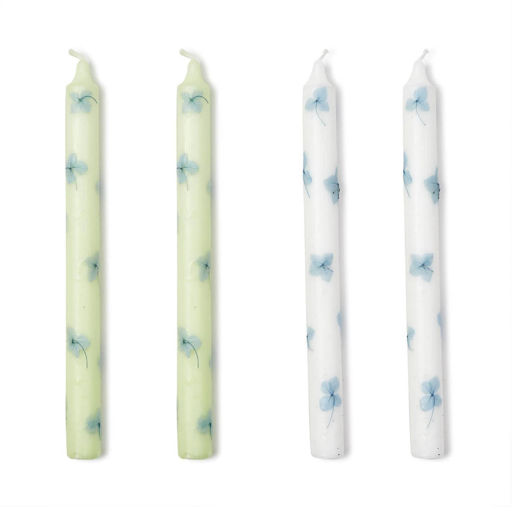 Two's Company Hydrangea Taper Candles, shown in green and white, 2 of each.