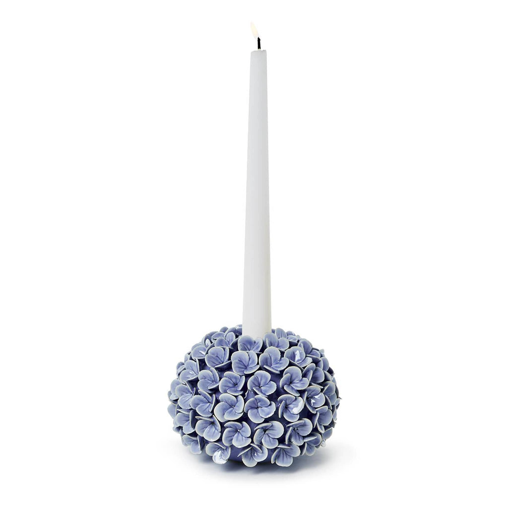 Two's Company Blue Hydrangea Porcelain Flower Bud Vase and Taper Holder, front view with white taper candle burning.