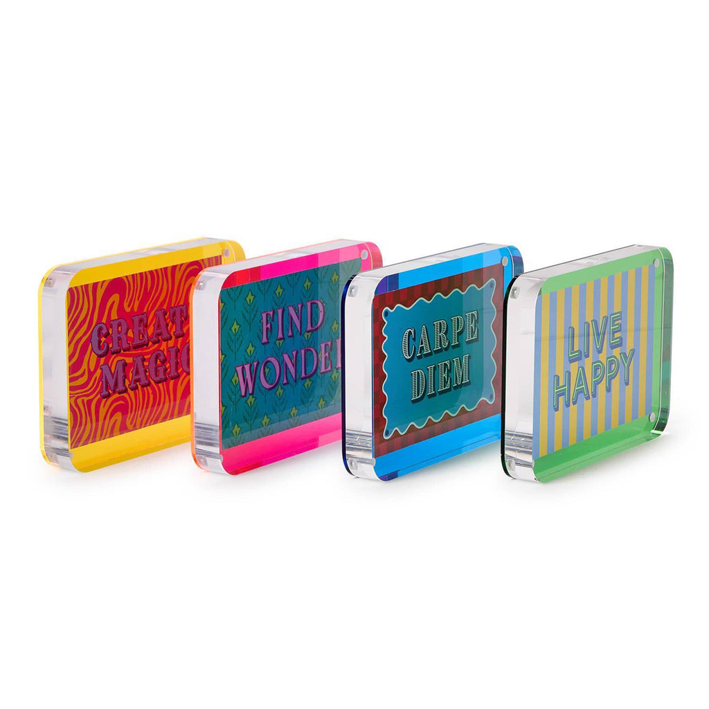 Four colorful acrylic frames with motivational phrases, angled, on a white background.
