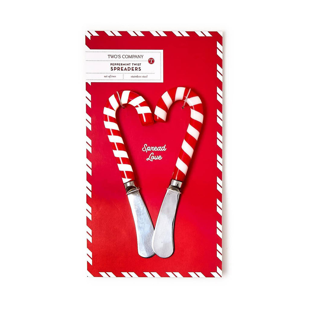 two's company peppermint twist cheese and jam spreaders, set of 2 in stainless steel with red and white striped candy cane handles on card packaging.