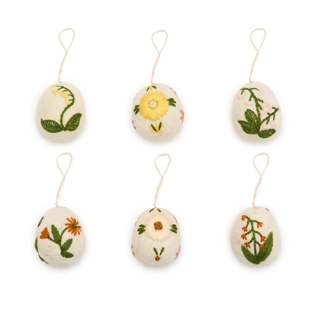 Two's Company wool felt eggs with colorful floral hand-embroidery in 6 designs with string for hanging.