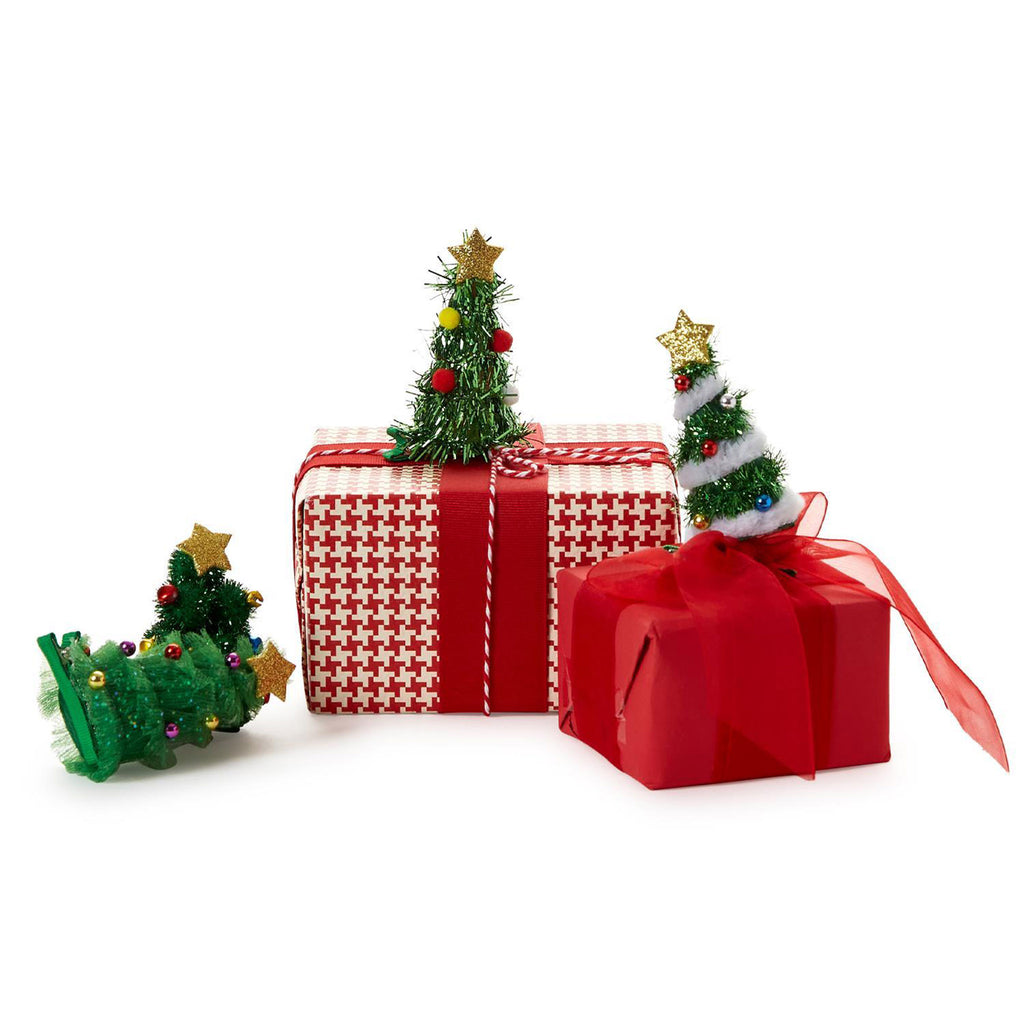 Two's Company Merry and Bright Christmas Tree Clip On Ornament in 4 styles, shown with red and white gift wrapped boxes.