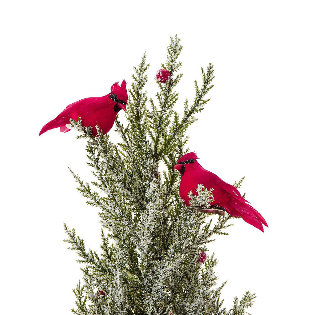 Two's Company clip-on-cardinal ornament, 2 are shown clipped on a flocked evergreen tree.