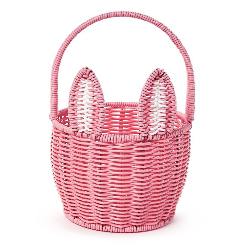 Two's Company Pink Faux Wicker Easter Basket with bunny ears, handle and pom pom tail, front view.