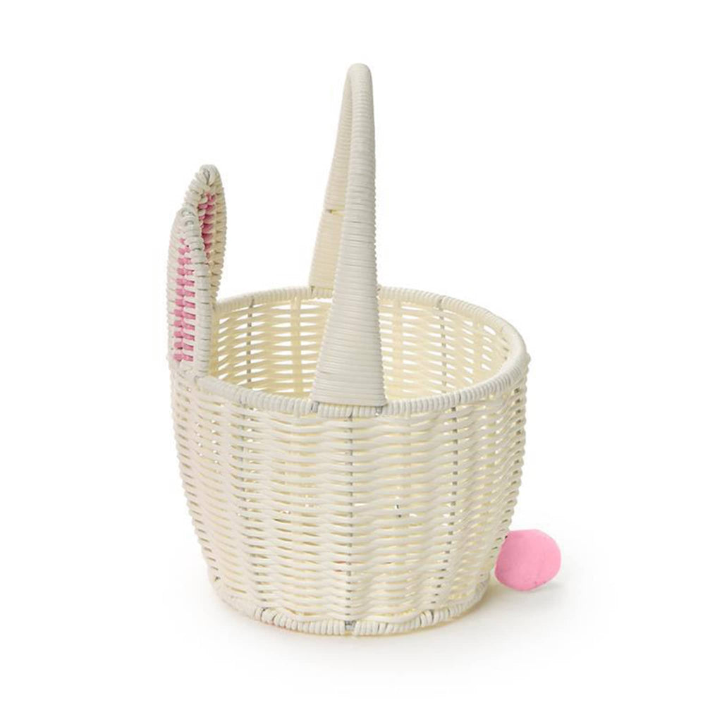 Two's Company White Faux Wicker Easter Basket with bunny ears, handle and pom pom tail, side view.