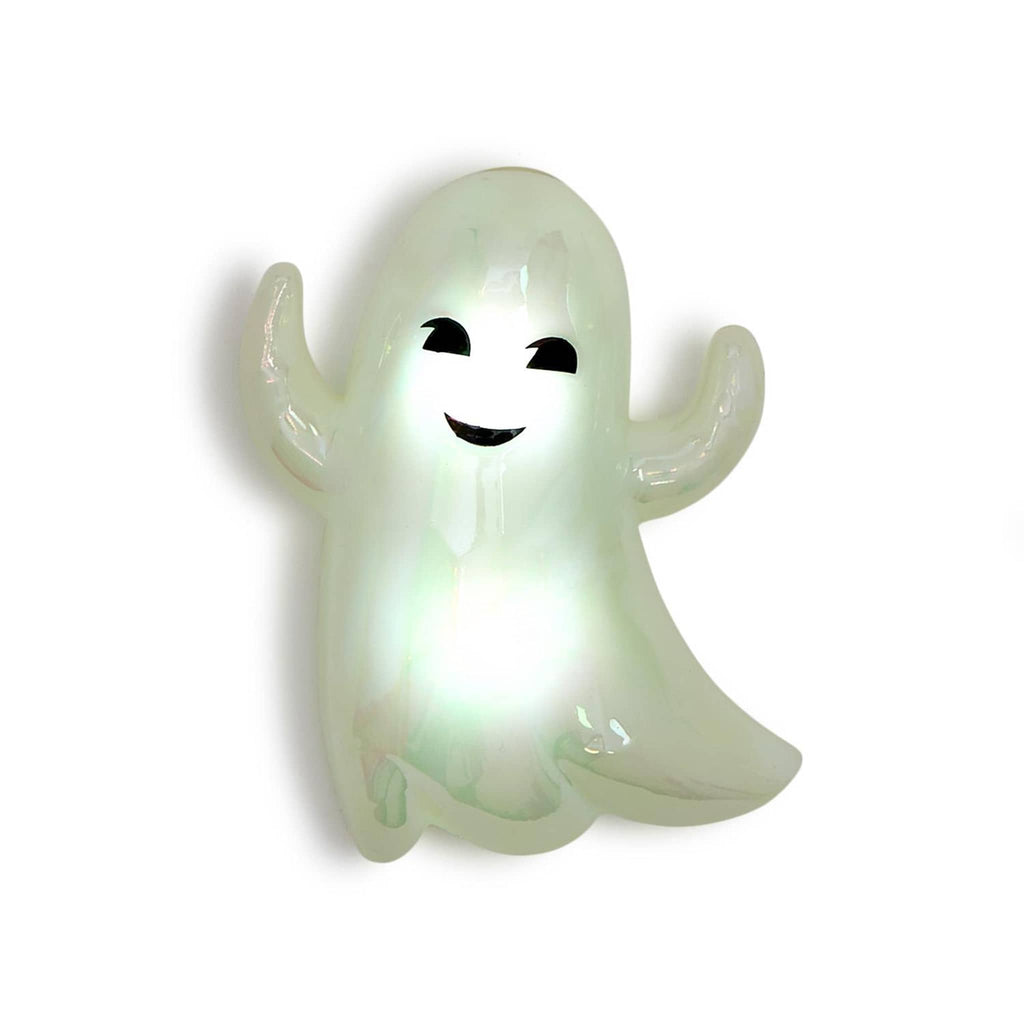 Glowing ghost-shaped light on a white background.