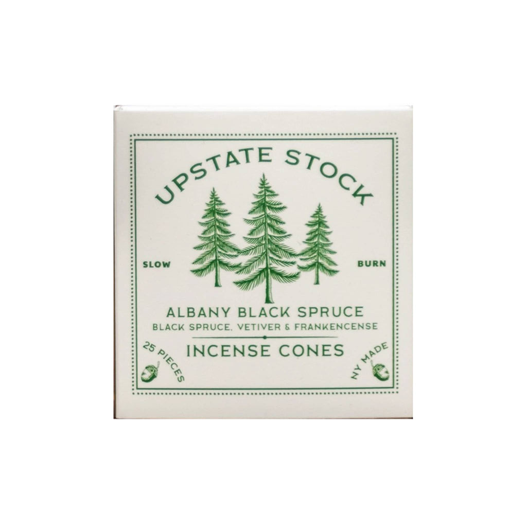 Upstate Stock Albany Black Spruce incense cones packaging with green trees and text on a white background.
