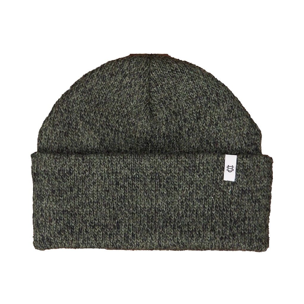 Dark green and gray wool knit beanie with a small white label on a white background.