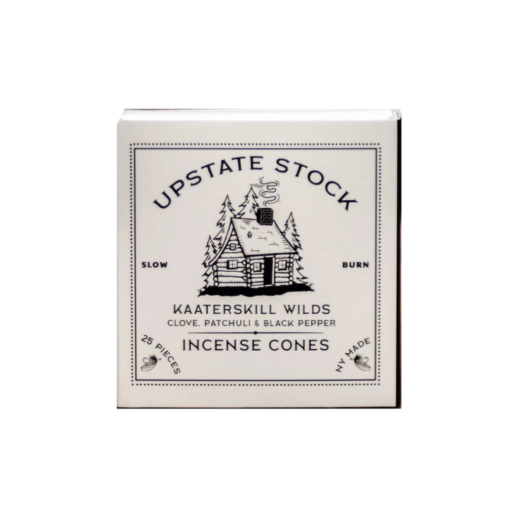 Box of Upstate Stock Kaaterskill Wilds Incense Cones with a cabin illustration in black on a white background.