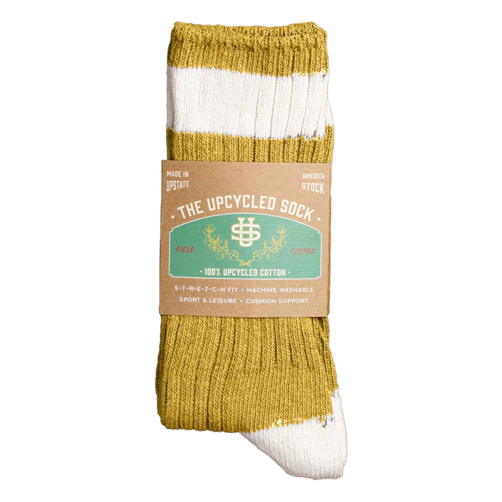 Mustard yellow and white sock with 'The Upcycled Sock' packaging on a white background.