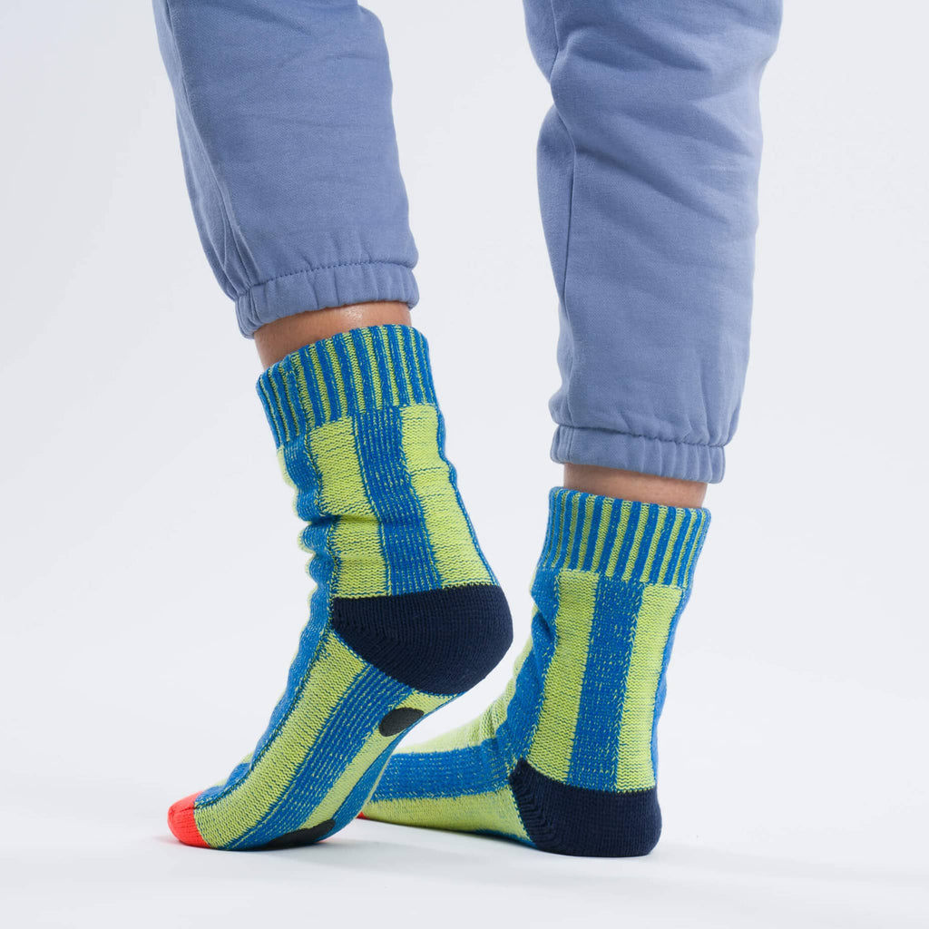 Verloop Lime and Cobalt Big Stripe Soft Acrylic House Socks, shown on model.