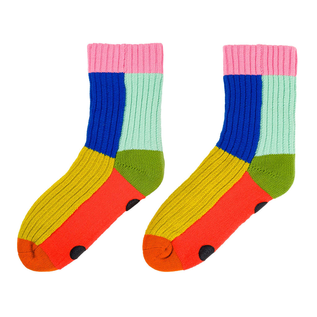 Colorful socks with pink, blue, green, and orange sections on a white background.
